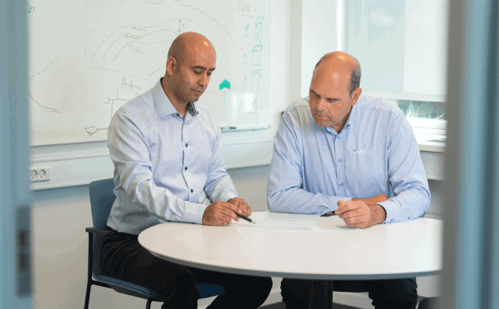 Two Insatech employees at a meeting